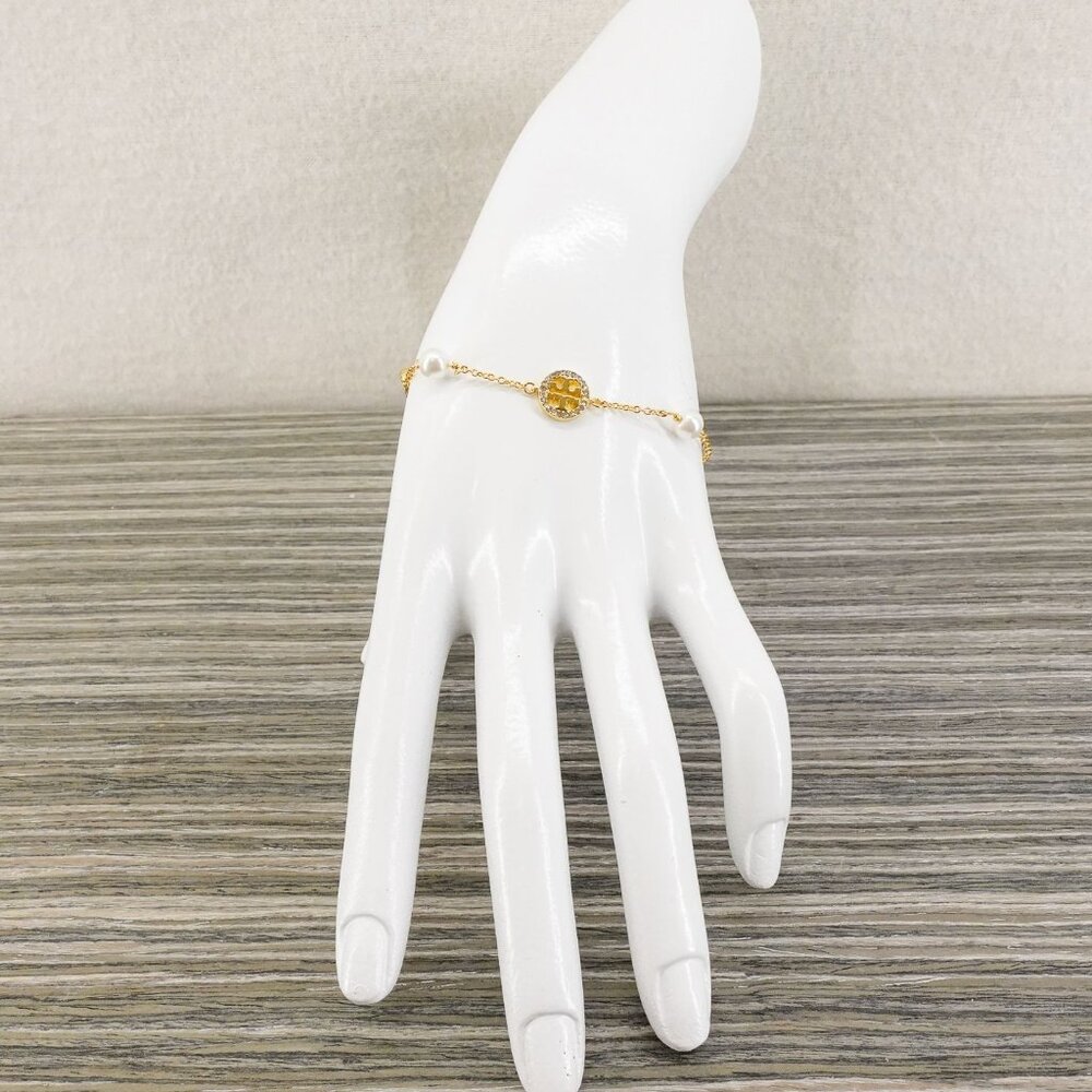 Tory Burch Crystal Logo & Imitation Pearl Station Bracelet Ivory/Tory Gold OS - Picture 8 of 16